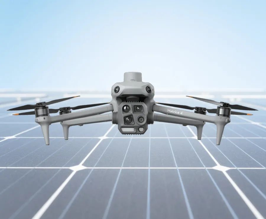 DJI Matrice 4T hovering over solar panels — multi-sensor inspection platform